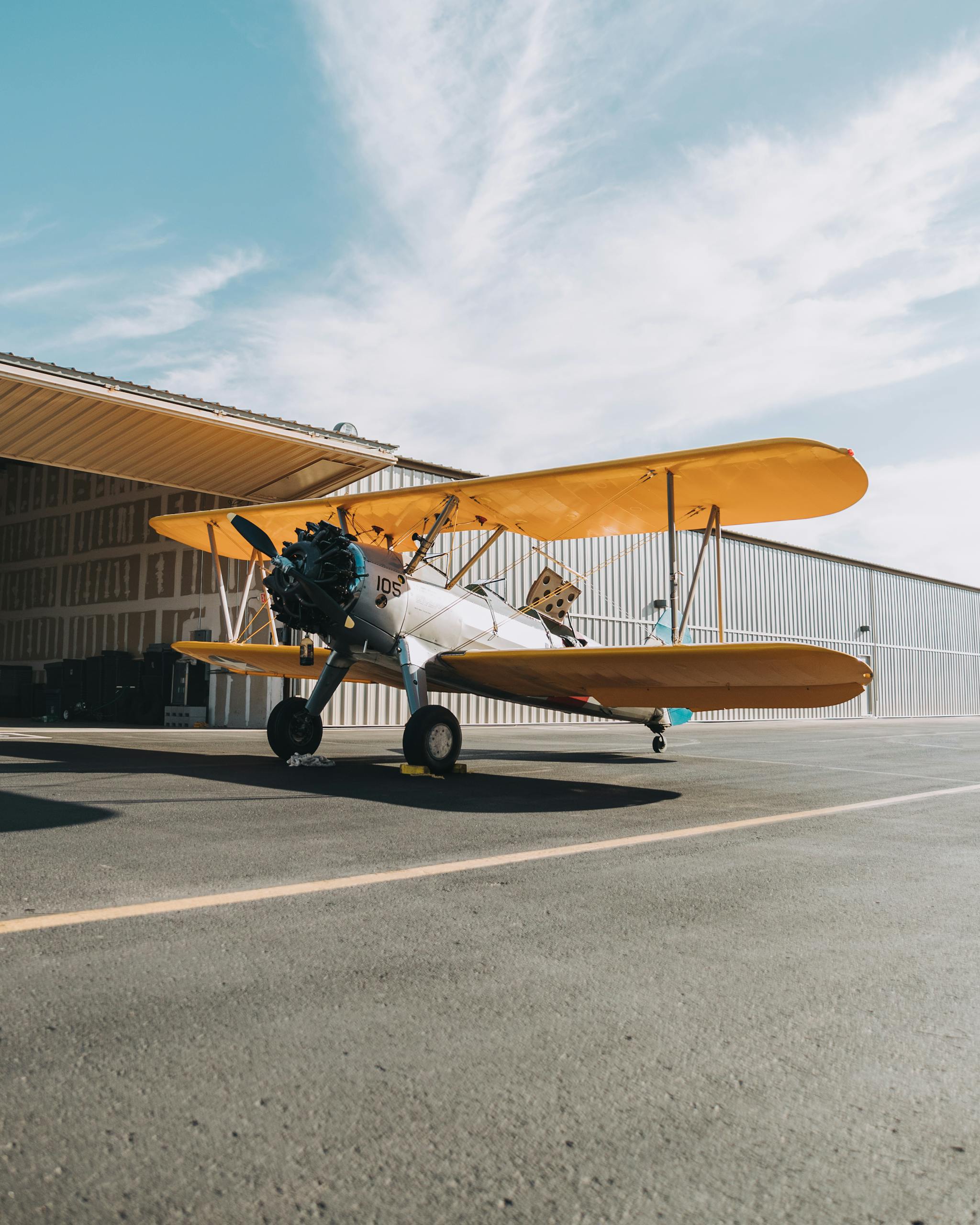 Crop duster on runway in daytime