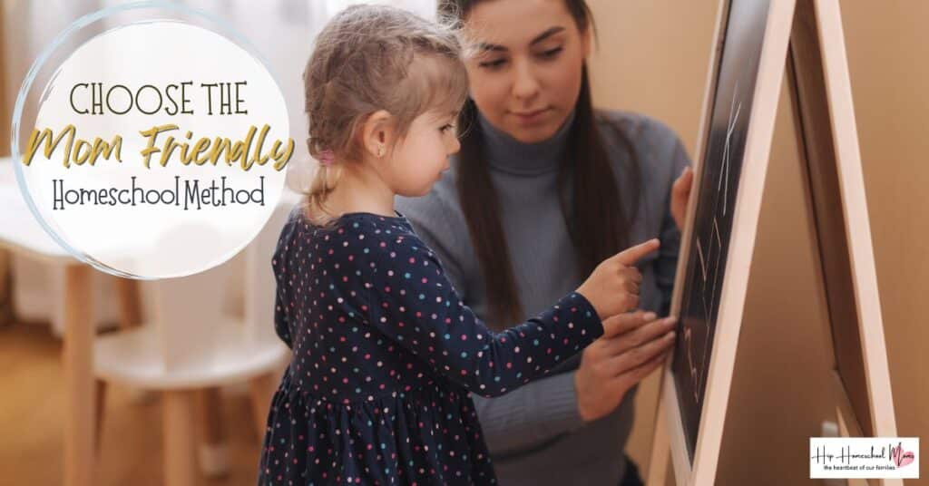 homeschool method - mom teaching young daughter at a blackboard