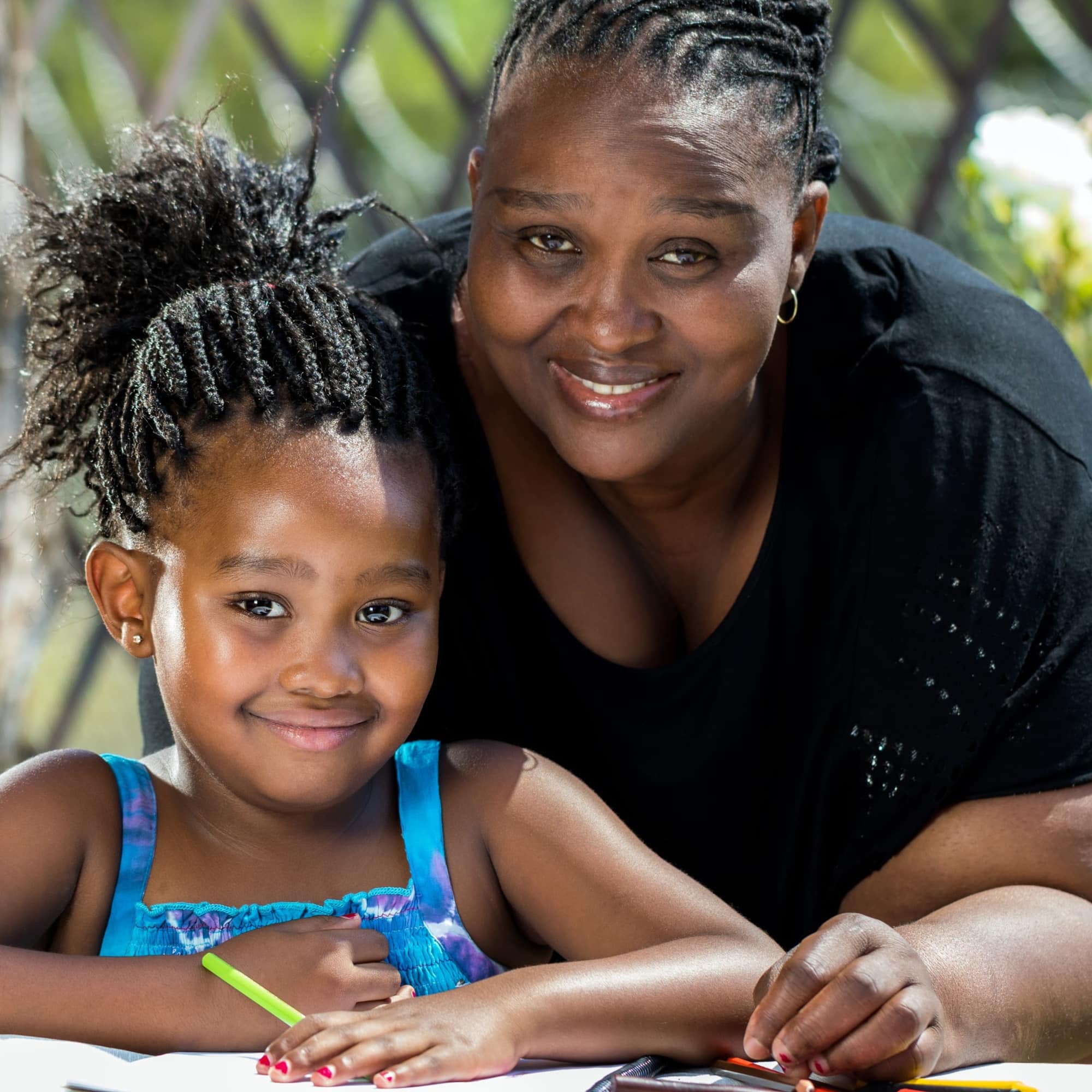 mom and daughter doing back to homeschool work