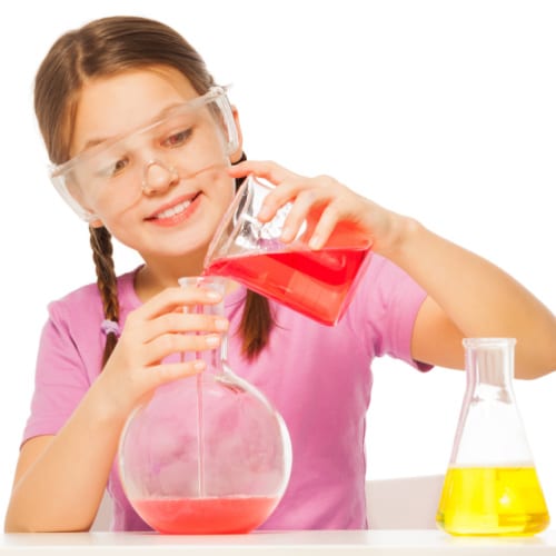 girl doing science experiment