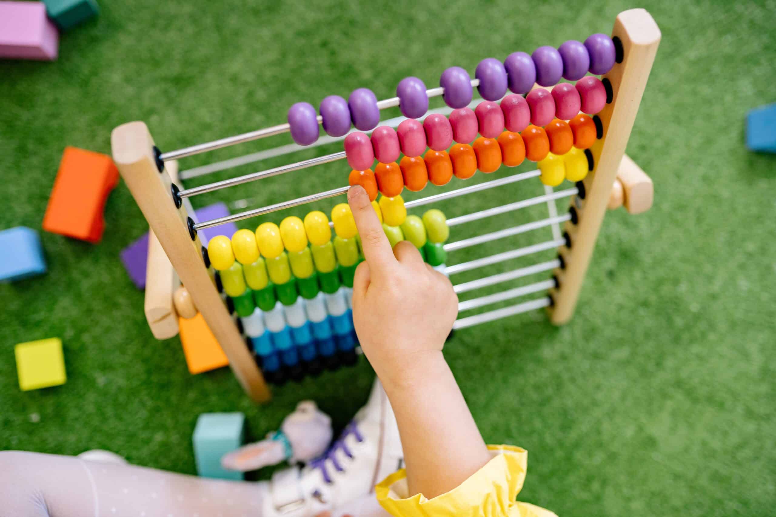 Why Math Matters: child using abacus